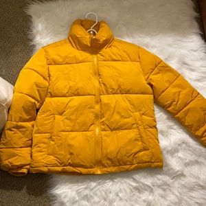 Yellow puffer jacket